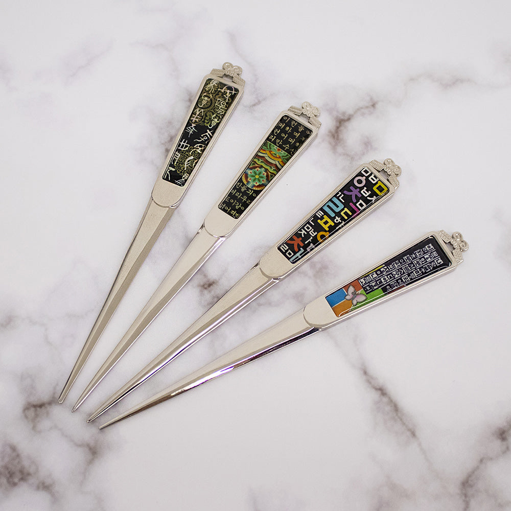 "Korean mother-of-pearl letter opener with traditional patterns"